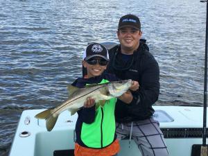Kid Fishing Snook 21 Tampa Bay Fishing Charter Capt. Matt Santiago